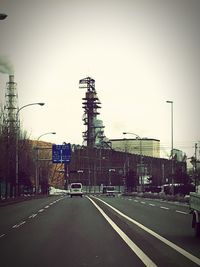 Road with buildings in background