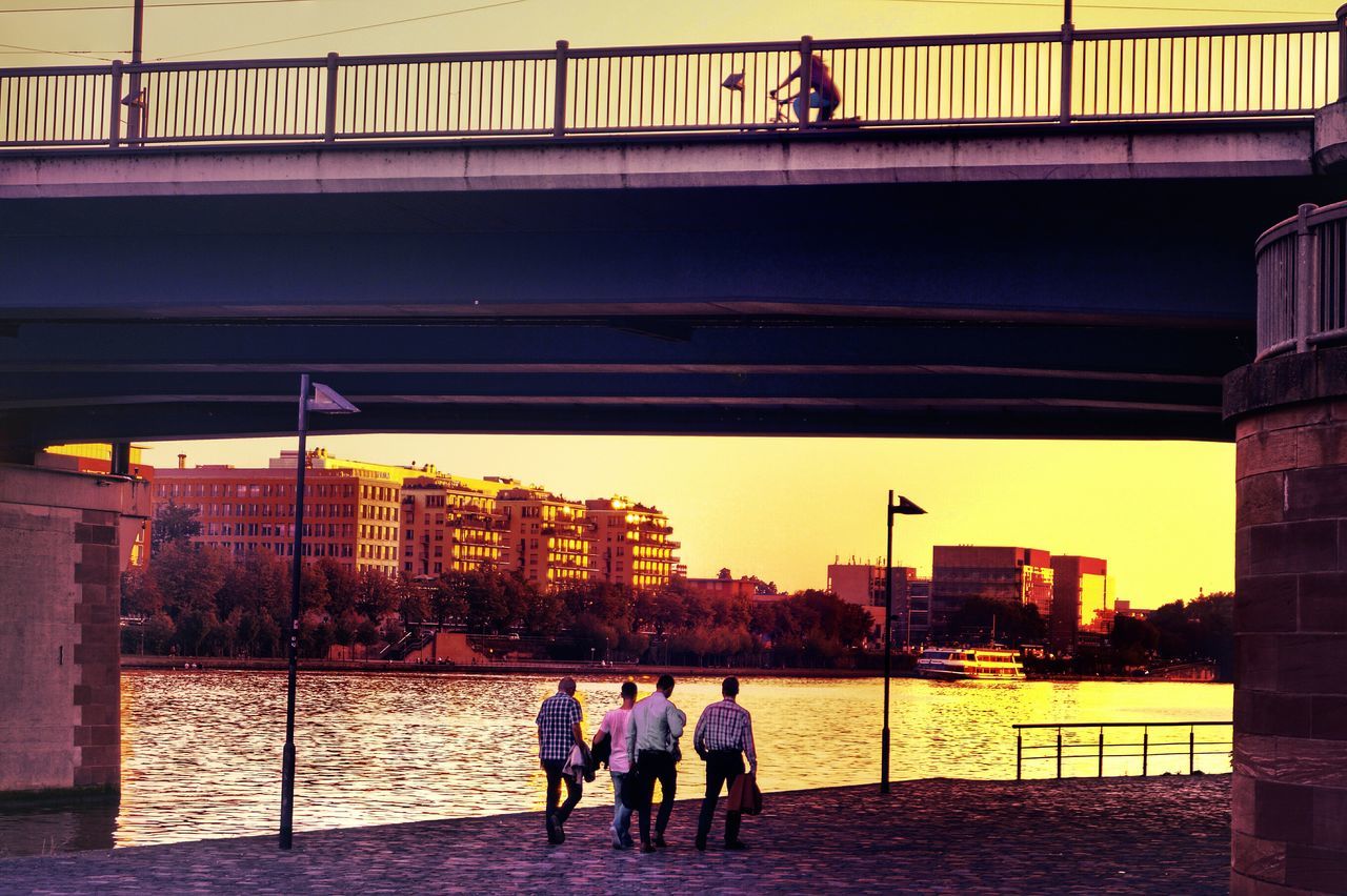 Four men walking home