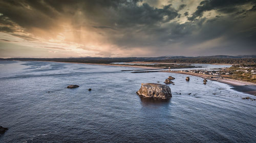 Scenic view of sea against sky during sunset