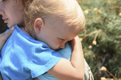 Close-up of cute boy and woman