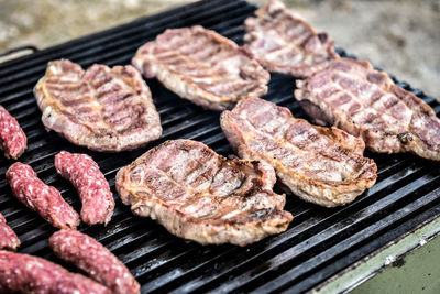 Close-up of meat on barbecue grill