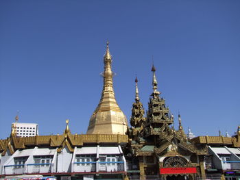 Temple against clear blue sky