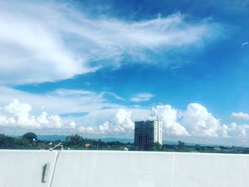 Buildings in city against sky