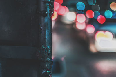 Defocused image of illuminated city at night