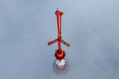 Low angle view of key against sky