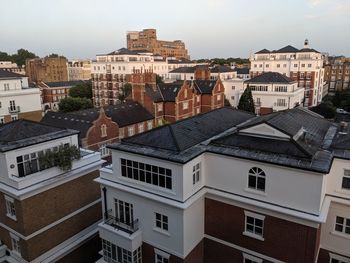 High angle view of residential buildings against sky