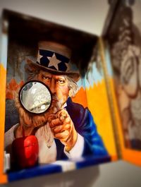 Close-up of painting on wall