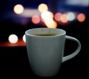 Close-up of coffee cup on table