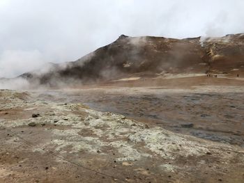 Smoke emitting from volcanic mountain