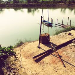 Fishing boat moored at lakeshore