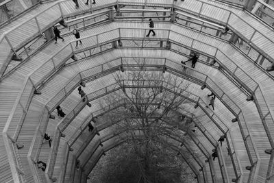 High angle view of people walking in building