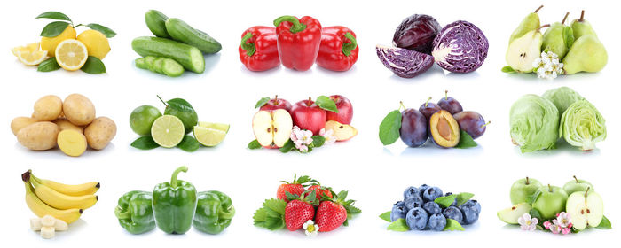 Various fruits and vegetables on white background