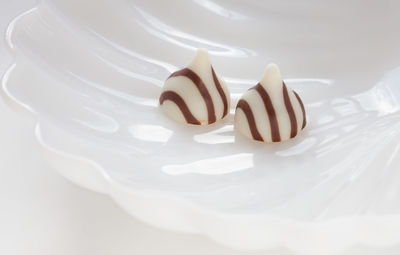 High angle view of cake on white background