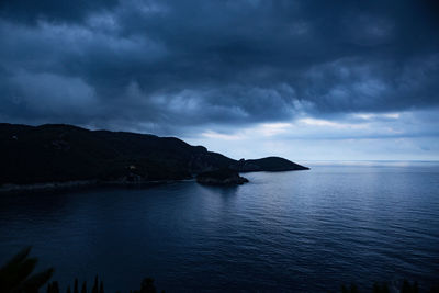 Enjoy lapping of waves under setting sun and coming twilight and night on one of islands or beaches