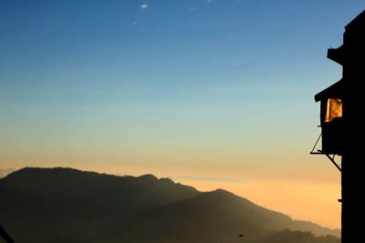 Scenic view of mountains at sunset