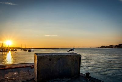 Scenic view of sea at sunset