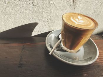 Close-up of cappuccino on table