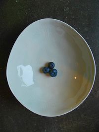 High angle view of fruits in plate on table