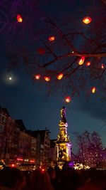 Illuminated street light at night