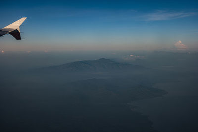 Scenic view of mountains against sky during sunset