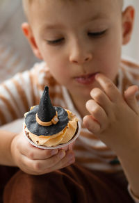 Close-up of baby girl eating food