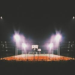 Illuminated street light at night