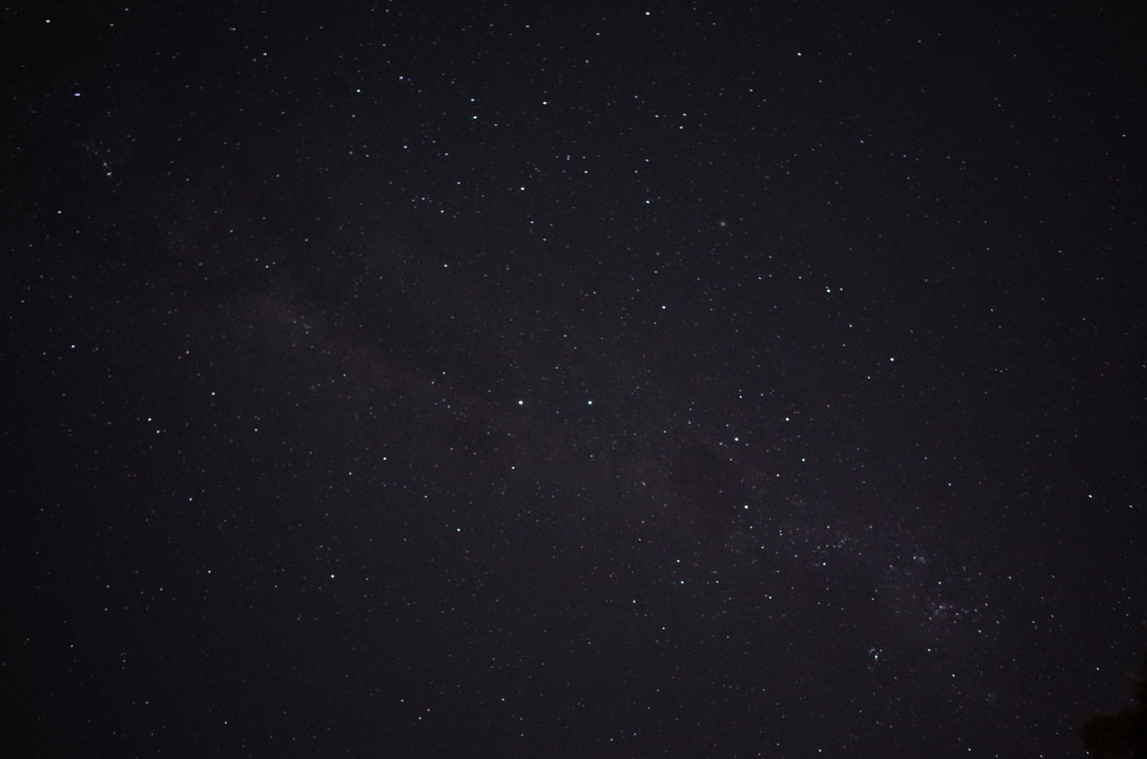 LOW ANGLE VIEW OF STARS AGAINST SKY