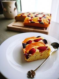 Cake in plate on table