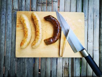 High angle view of bread on cutting board