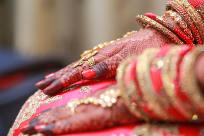 Close-up of woman with red sari and jewellery