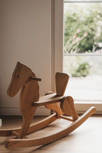 Close-up of open book on table at home