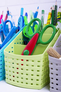 Close-up of multi colored pencils in basket