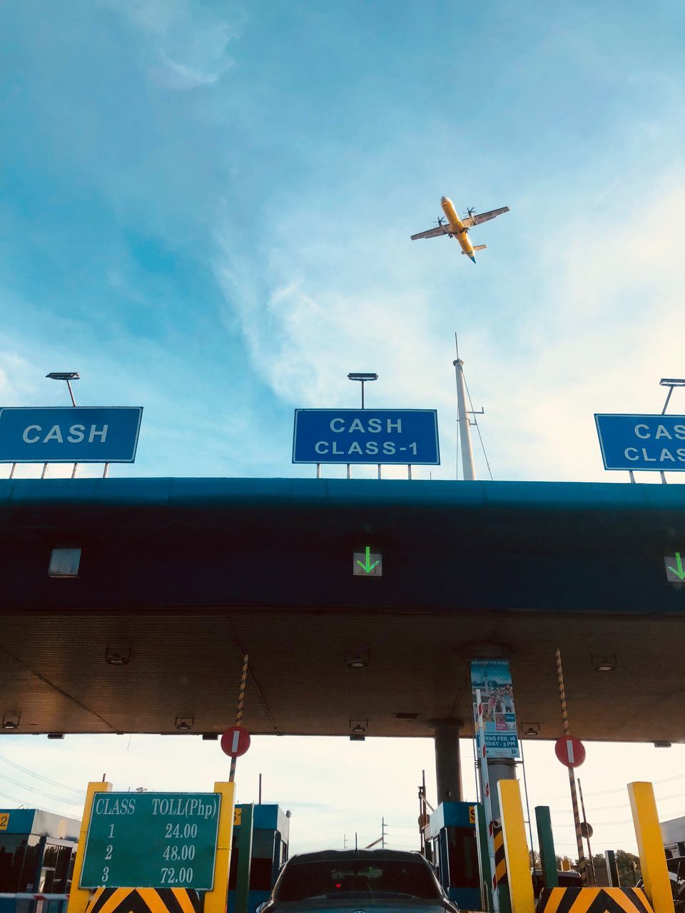 low angle view, mode of transportation, transportation, air vehicle, flying, sky, airplane, architecture, cloud - sky, built structure, building exterior, on the move, travel, day, no people, nature, motion, public transportation, outdoors, mid-air, plane, aerospace industry