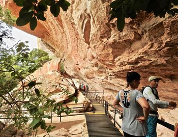 People on rock formation