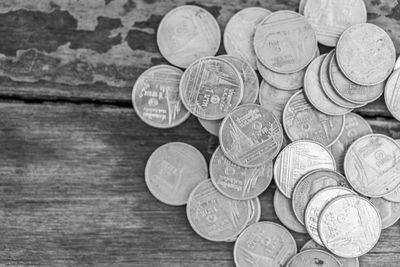 High angle view of coins on table