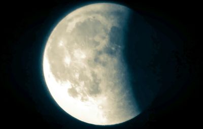 Low angle view of moon against sky