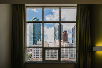 City seen through window