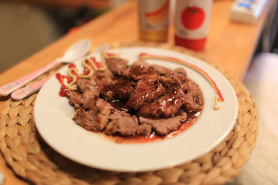 Close-up of meat in plate on table