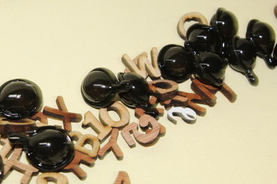 Close-up of objects on table against white background