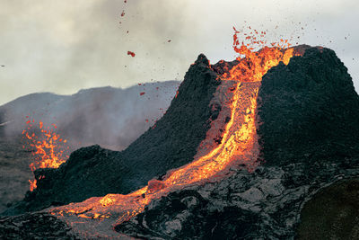 Panoramic view of volcanic mountain against sky