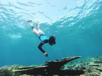 Man swimming in sea