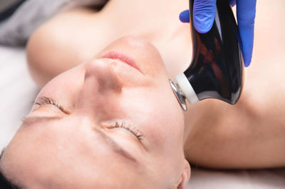 Low section of woman with iv drip