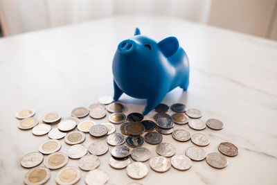 Close-up of coins on table