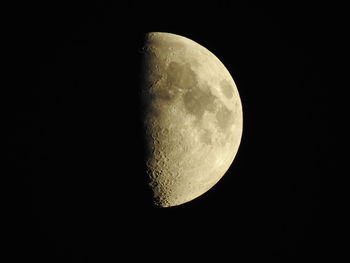 Low angle view of moon against clear sky at night