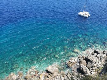 High angle view of sailboat on sea against sky