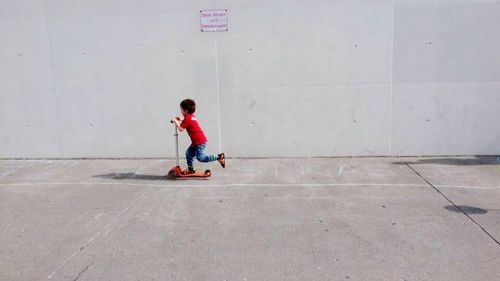 Boy playing with skateboard