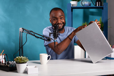 Man using laptop at table