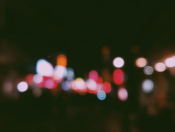 Defocused image of illuminated lights at night