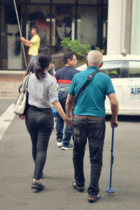 Rear view of men friends