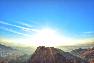 Scenic view of mountains against sky during sunset